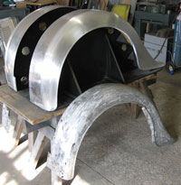 Old and new aluminium rear Bentley wings