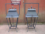 A pair of steel lanterns