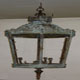 An Ornate circular French lantern aged and after a reconstruction, hanging