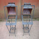 A pair of aged steel lanters with lids open
