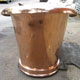 Side view of original French polished copper roll top bath, finished