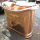 Another side view of original French polished copper roll top bath, finished