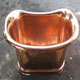 Top of original French polished copper roll top bath, finished