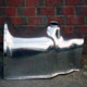 A new small flanged Austin Healey 3000 polished gearbox cover, nearside