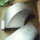 A new handmade pair of steel front wings for an Edwardian Sunbeam, top