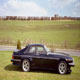 Black Emblem Jaguar XJS with body kit, offside