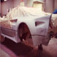 Ferrari 308 GTB with a new Emblem body kit being painted, nearside and rear