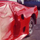 Ferrari 308 GTB with a new Emblem body kit being painted, nearside rear in red