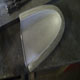 The newly completed aluminium Jaguar D-Type mirror cowling, inside