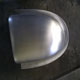 The newly completed aluminium Jaguar D-Type mirror cowling, top