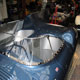 A nickel plated Jaguar D-Type screen surround fitted to car, nearside front