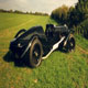 The green Lagonda V12 Le Mans, with new aluminium body, painted, offside