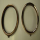 Lucas P100 Headlight bezels after copper plating with one polished